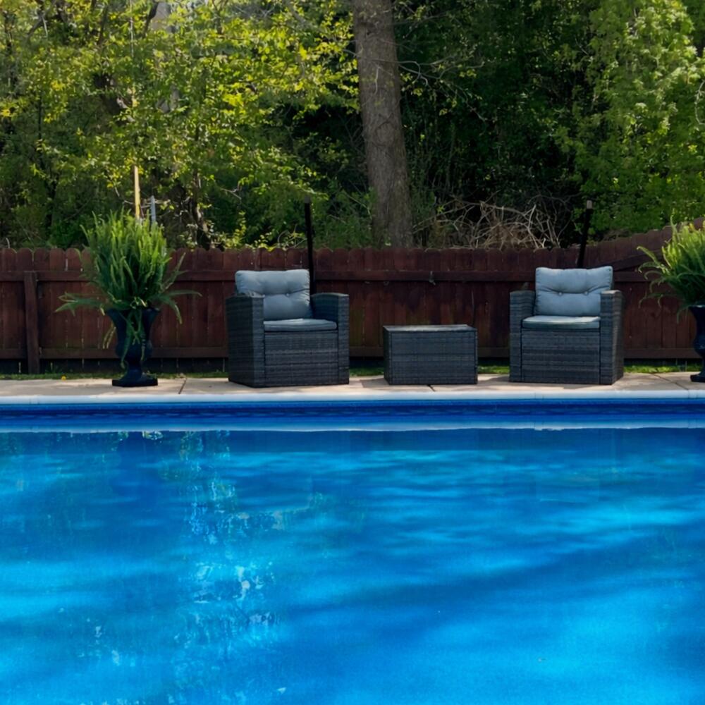 1327 Montclair Place Fort Atkinson, WI 53538 - Photo 52 of 55 Backyard poolside retreat with wicker se