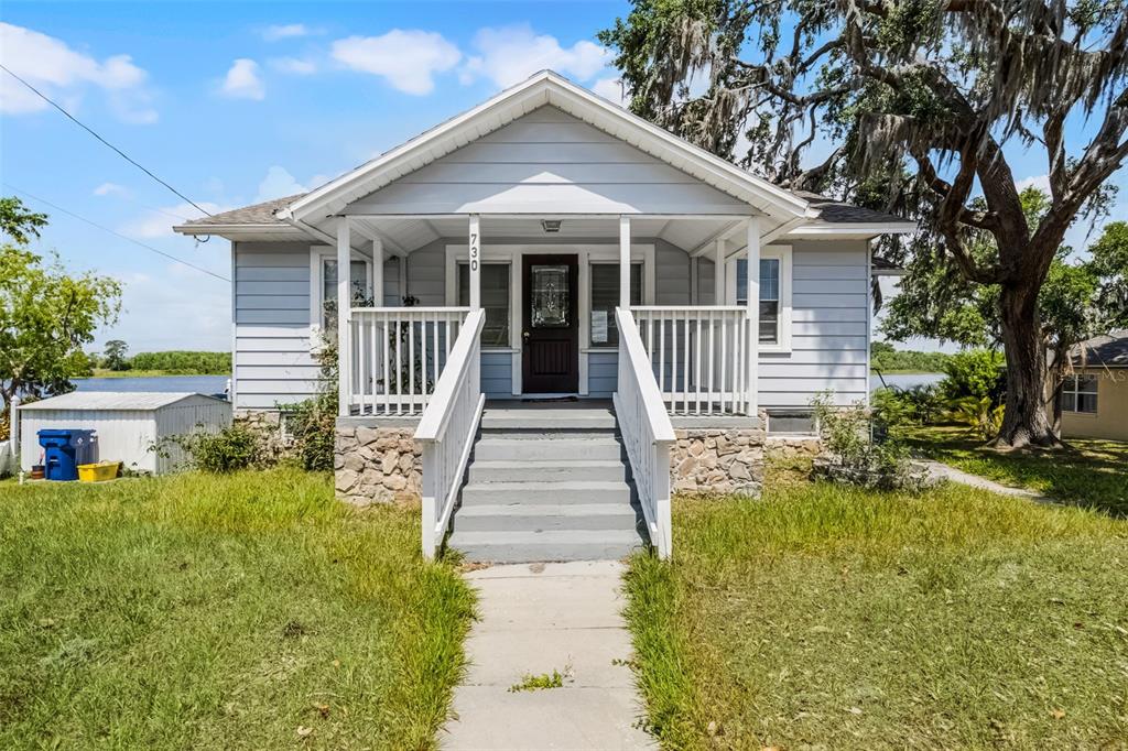 730 South Main Avenue Groveland, FL 34736 - Photo 1 of 1 a front view of a house with a yard
