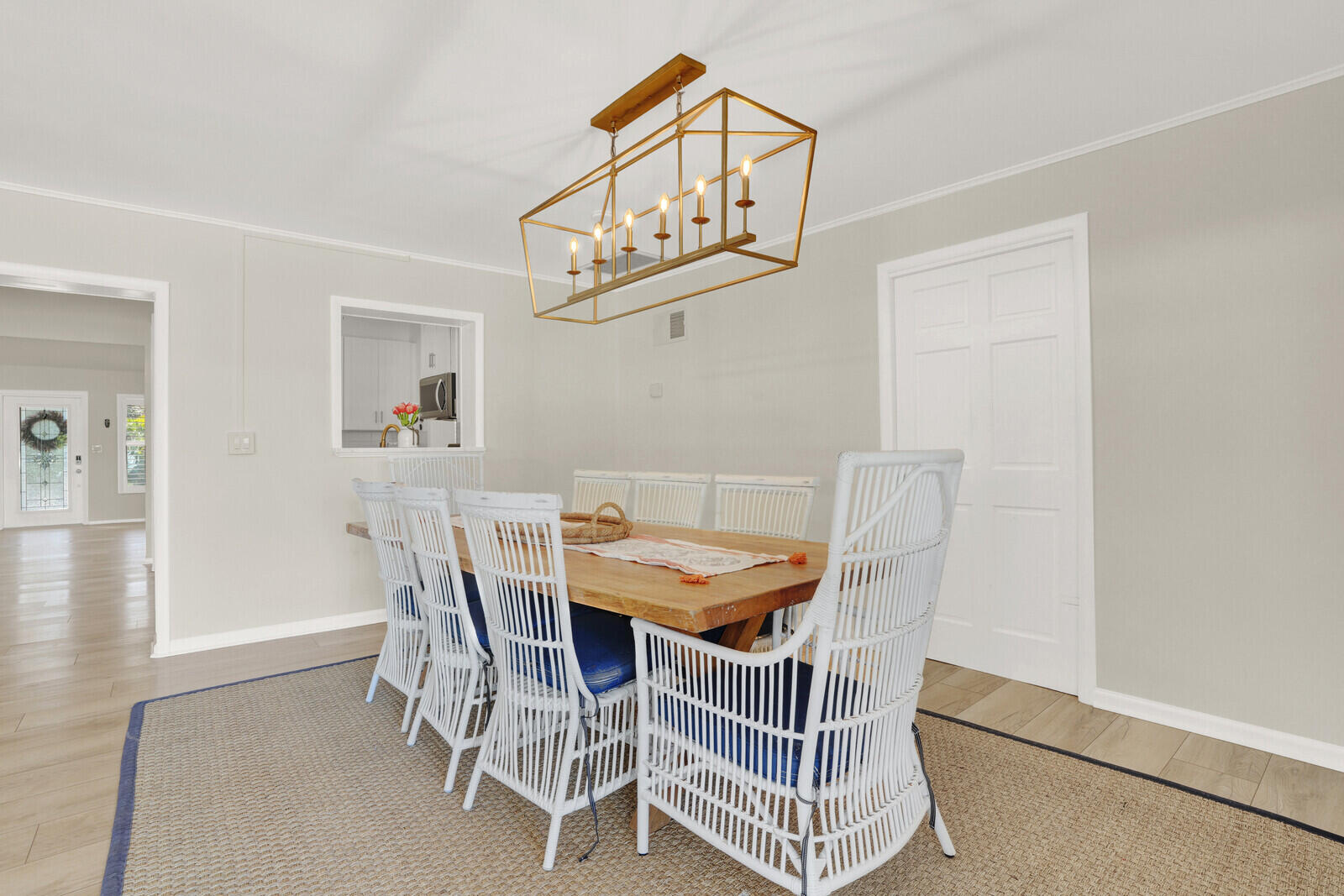 12980 Prosperity Farms Road Palm Beach Gardens, FL 33410 - Photo 17 of 55 a view of a dining room with furniture and wooden floor