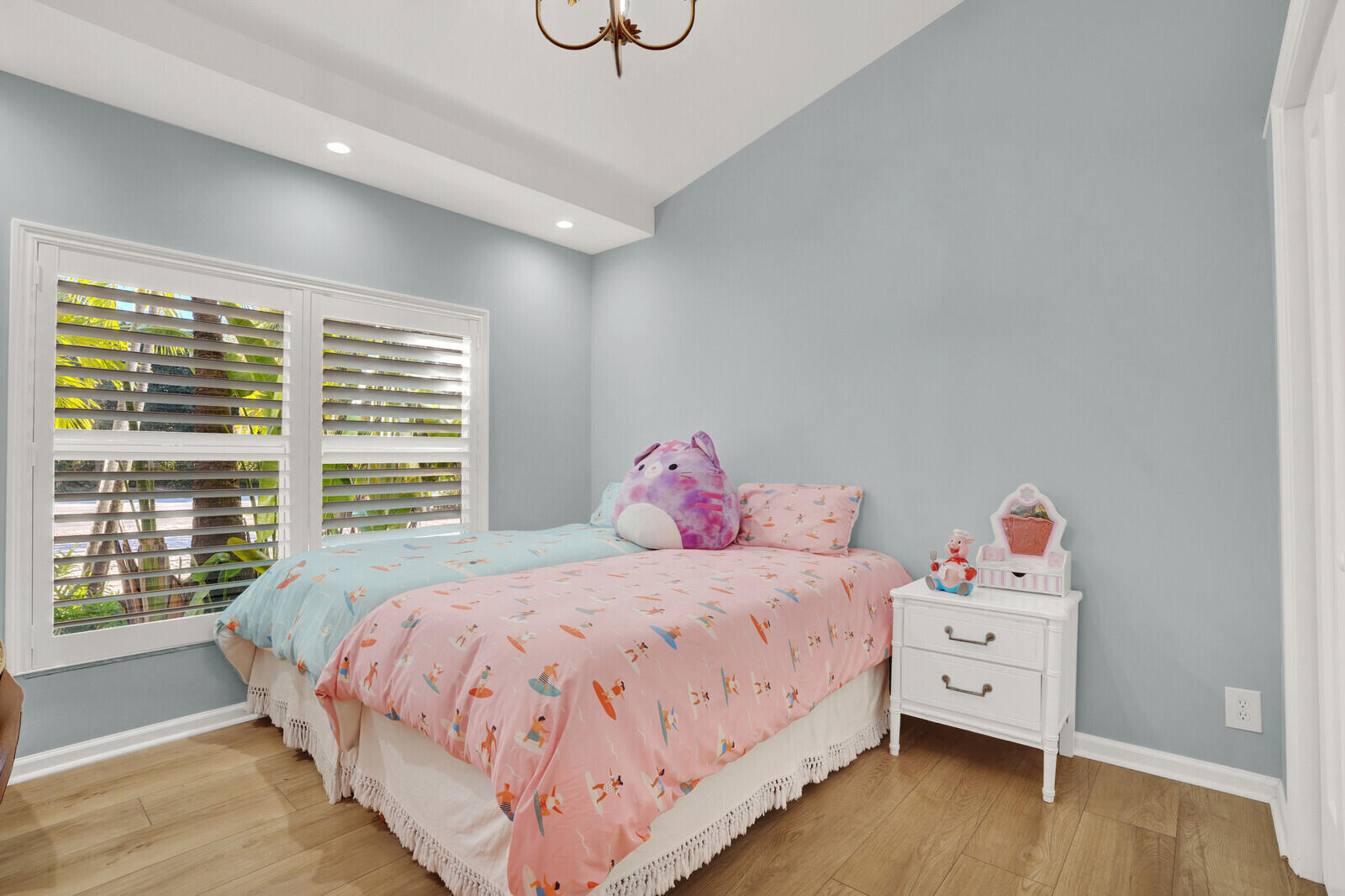 12980 Prosperity Farms Road Palm Beach Gardens, FL 33410 - Photo 28 of 55 a bedroom with a bed and a large window