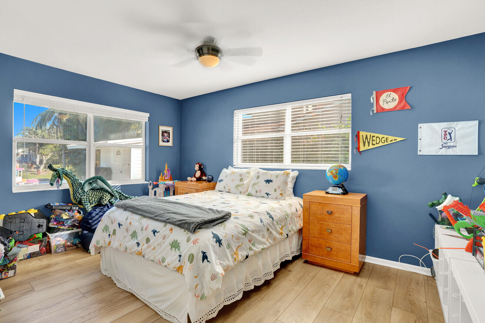 12980 Prosperity Farms Road Palm Beach Gardens, FL 33410 - Photo 38 of 55 a bedroom with a bed and a window