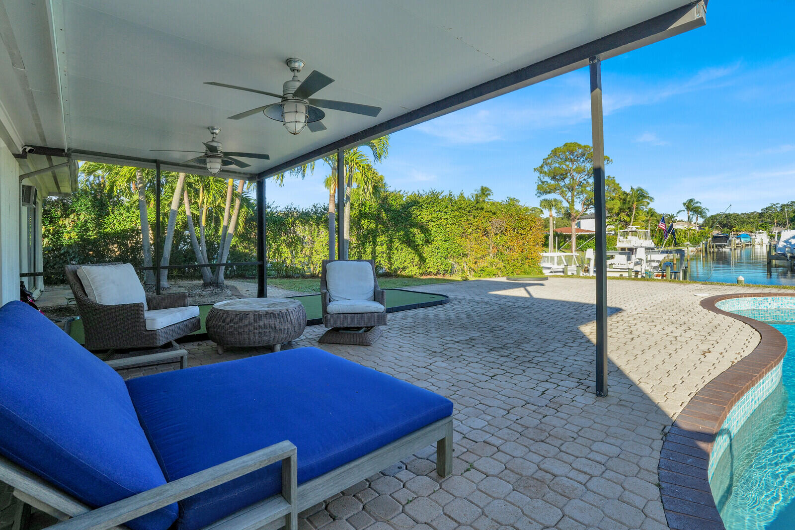12980 Prosperity Farms Road Palm Beach Gardens, FL 33410 - Photo 39 of 55 a view of an outdoor sitting space