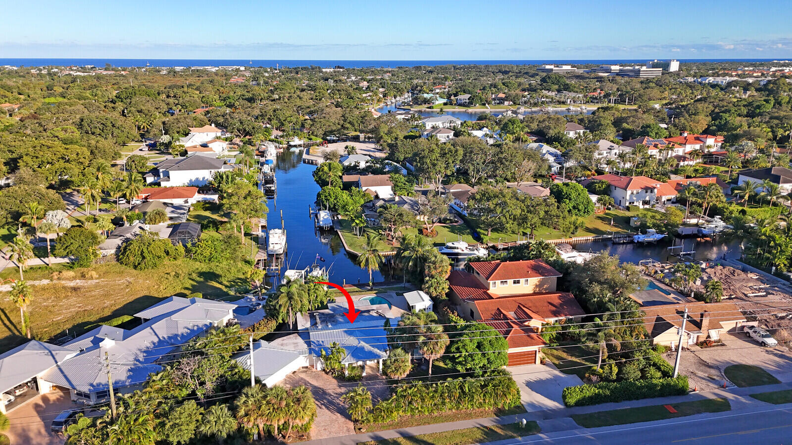 12980 Prosperity Farms Road Palm Beach Gardens, FL 33410 - Photo 51 of 55 an aerial view of a city