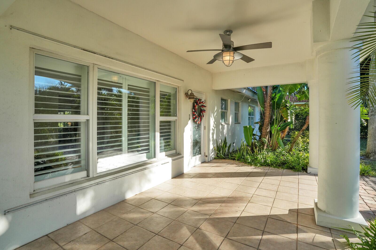 12980 Prosperity Farms Road Palm Beach Gardens, FL 33410 - Photo 8 of 55 a view of a entryway of the house