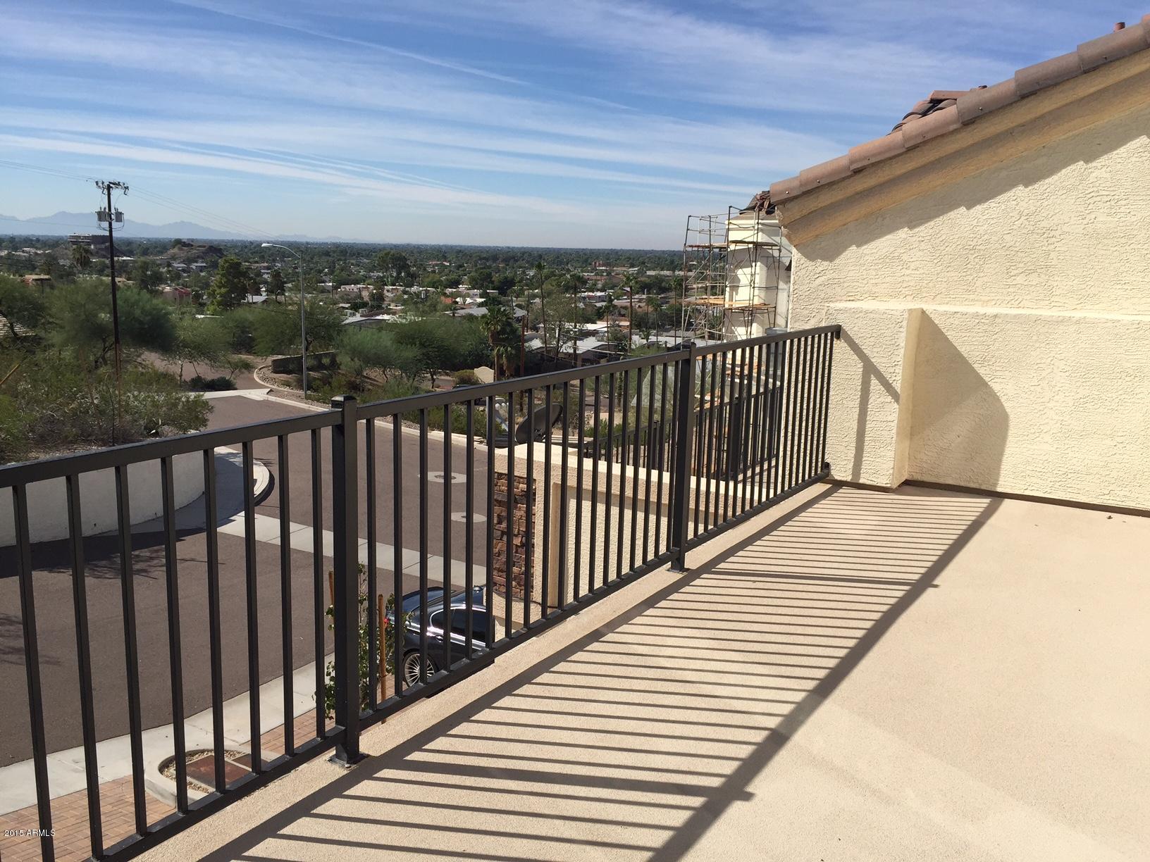 1502 East Dunlap Avenue, Unit 12 Phoenix, AZ 85020 - Photo 3 of 16 a view of balcony with staircase