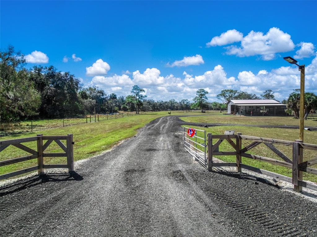 15405 Old Parker Island Road Lake Placid, FL 33852 - Photo 36 of 39 a view of an outdoor space with seating