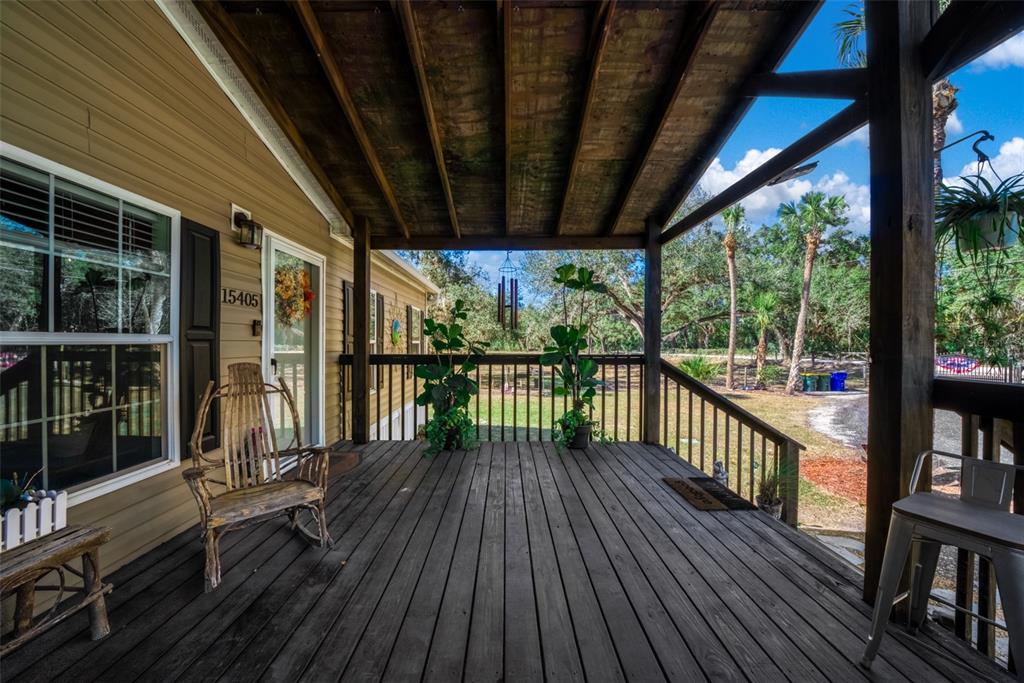 15405 Old Parker Island Road Lake Placid, FL 33852 - Photo 5 of 39 a view of balcony with wooden floor