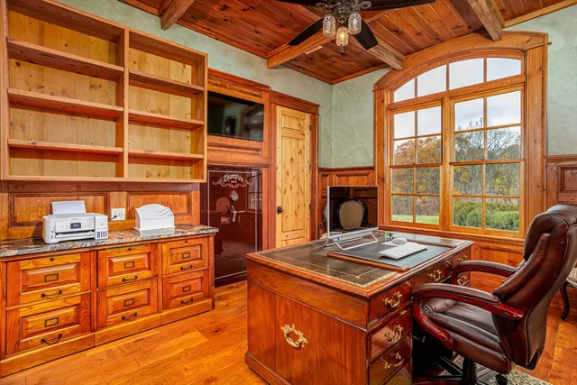 a kitchen with stainless steel appliances granite countertop a stove and a wooden cabinets