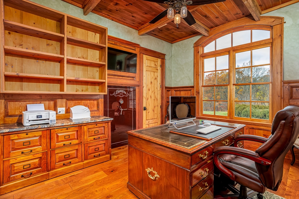 210 Indian Hill Road Groton, MA 01450 - Photo 15 of 42 a kitchen with stainless steel appliances granite countertop a stove and a wooden cabinets