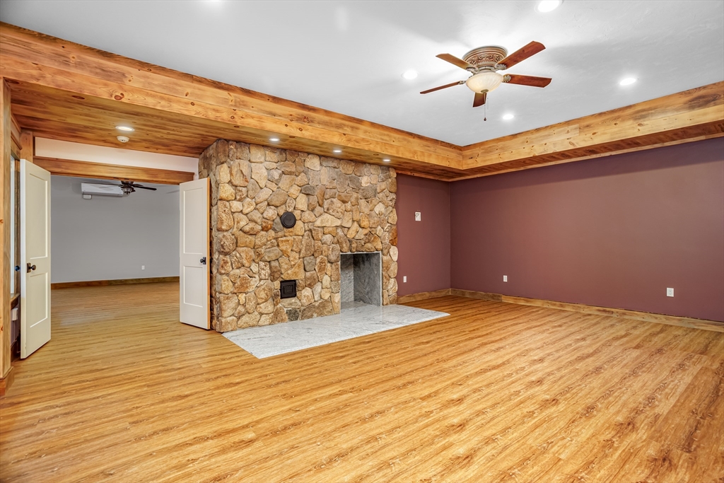 210 Indian Hill Road Groton, MA 01450 - Photo 25 of 42 a view of an empty room and a window