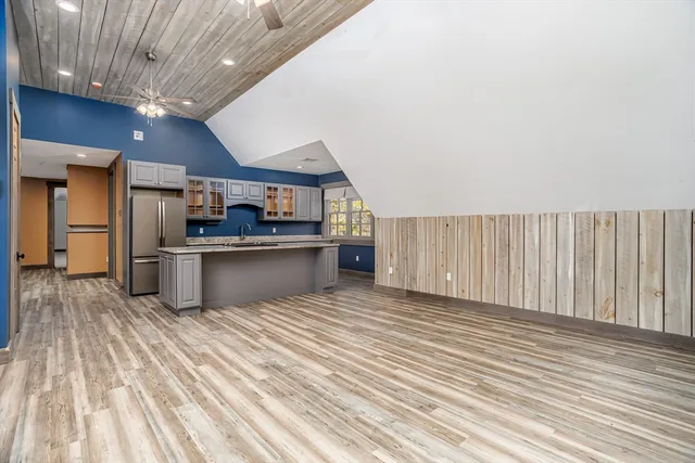 a view of kitchen with wooden floor