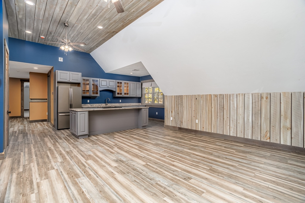 210 Indian Hill Road Groton, MA 01450 - Photo 31 of 42 a view of kitchen with wooden floor