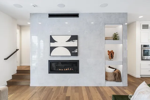 a view of an entryway with wooden floor