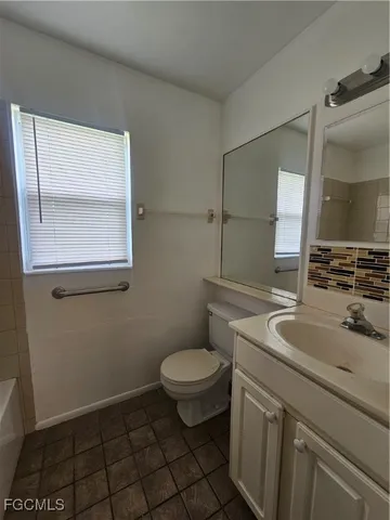 a view of an empty room with window