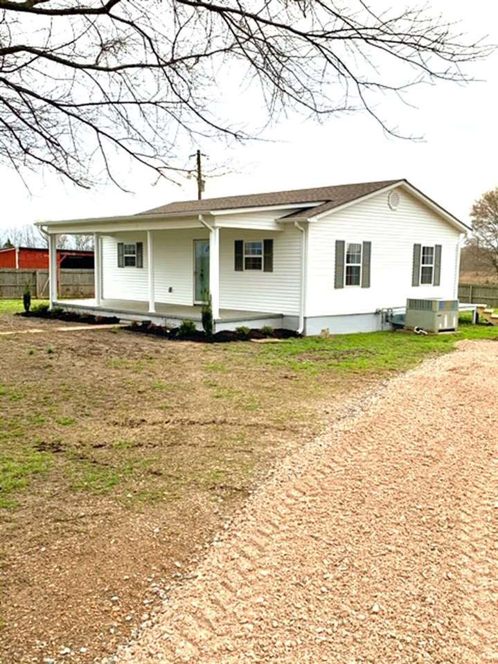 3205 Sunshine Road Henderson, TN 38340 - Photo 1 of 1 a front view of a house with a yard
