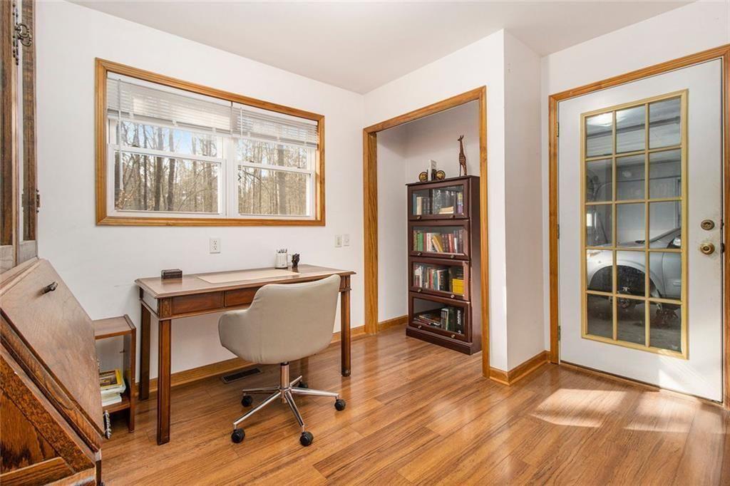 490 Dorsey Road Hampton, GA 30228 - Photo 12 of 63 a workspace with wooden floor and a window