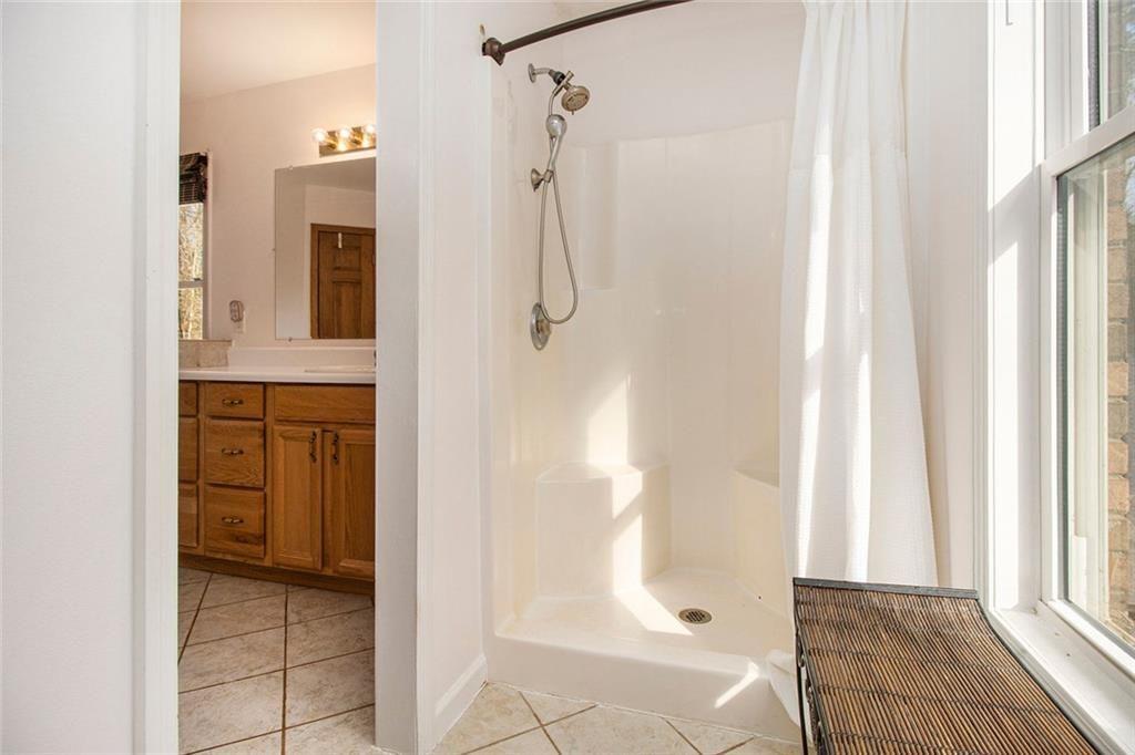 490 Dorsey Road Hampton, GA 30228 - Photo 18 of 63 a bathroom with a shower