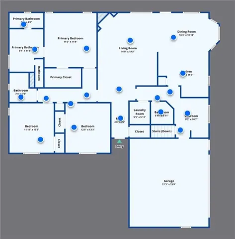 a view of a field with trees in the background