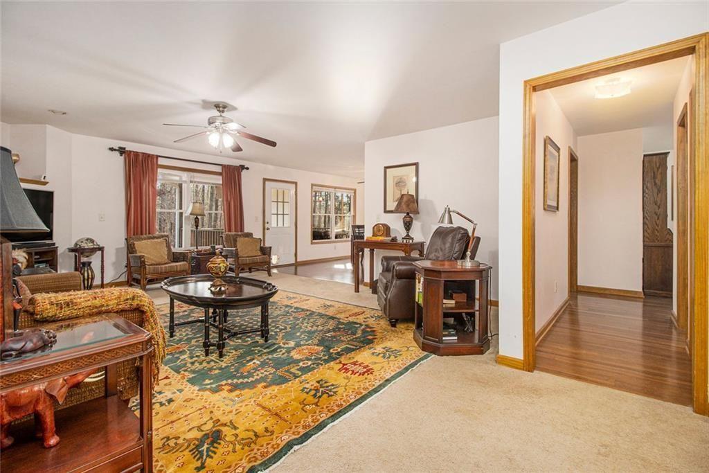 490 Dorsey Road Hampton, GA 30228 - Photo 5 of 63 a living room with furniture a dining table and chairs with wooden floor