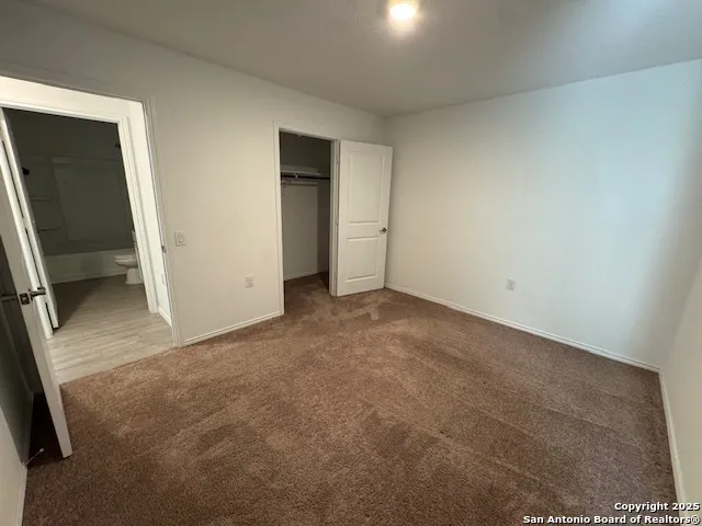 an empty room with closet