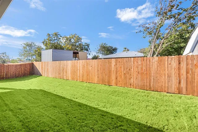 a front view of a house with yard