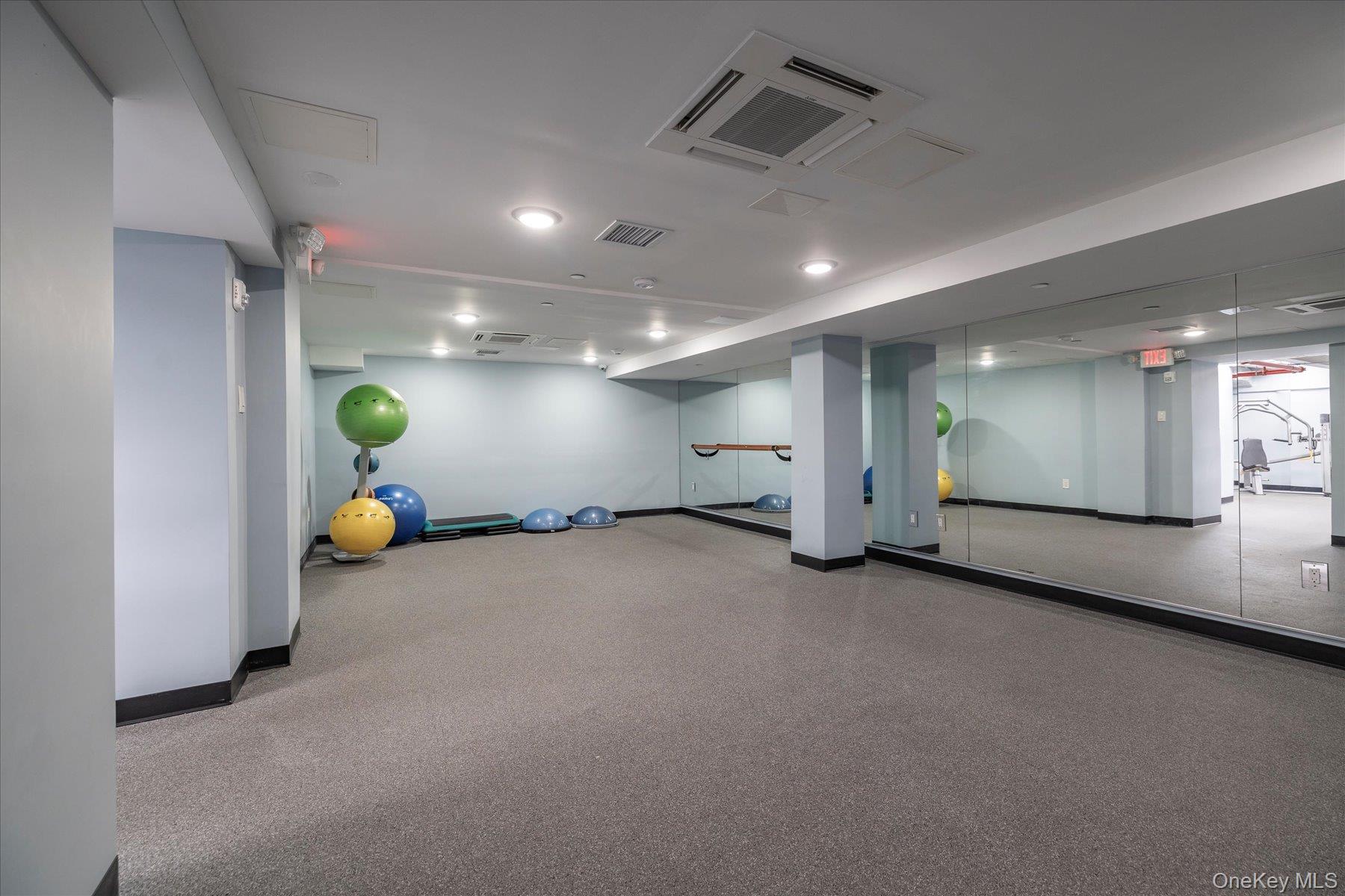 2 Richmond Road, Unit 4A Lido Beach, NY 11561 - Photo 28 of 33 a view of a livingroom with a furniture and a ceiling fan