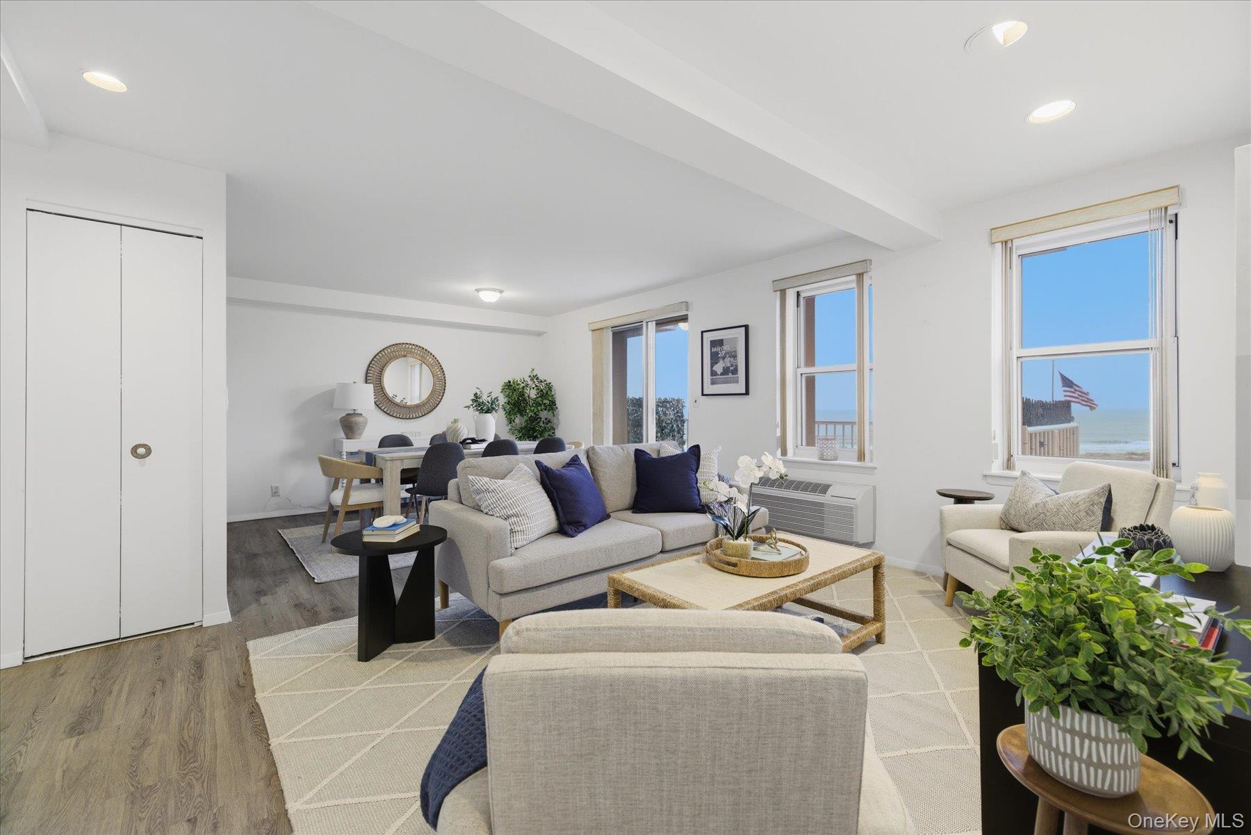 2 Richmond Road, Unit 4A Lido Beach, NY 11561 - Photo 8 of 33 a living room with furniture and a window