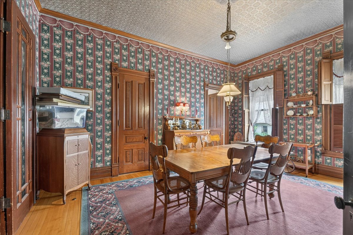 622 North 7th Street Rochelle, IL 61068 - Photo 19 of 52 a view of a dining room with furniture and window