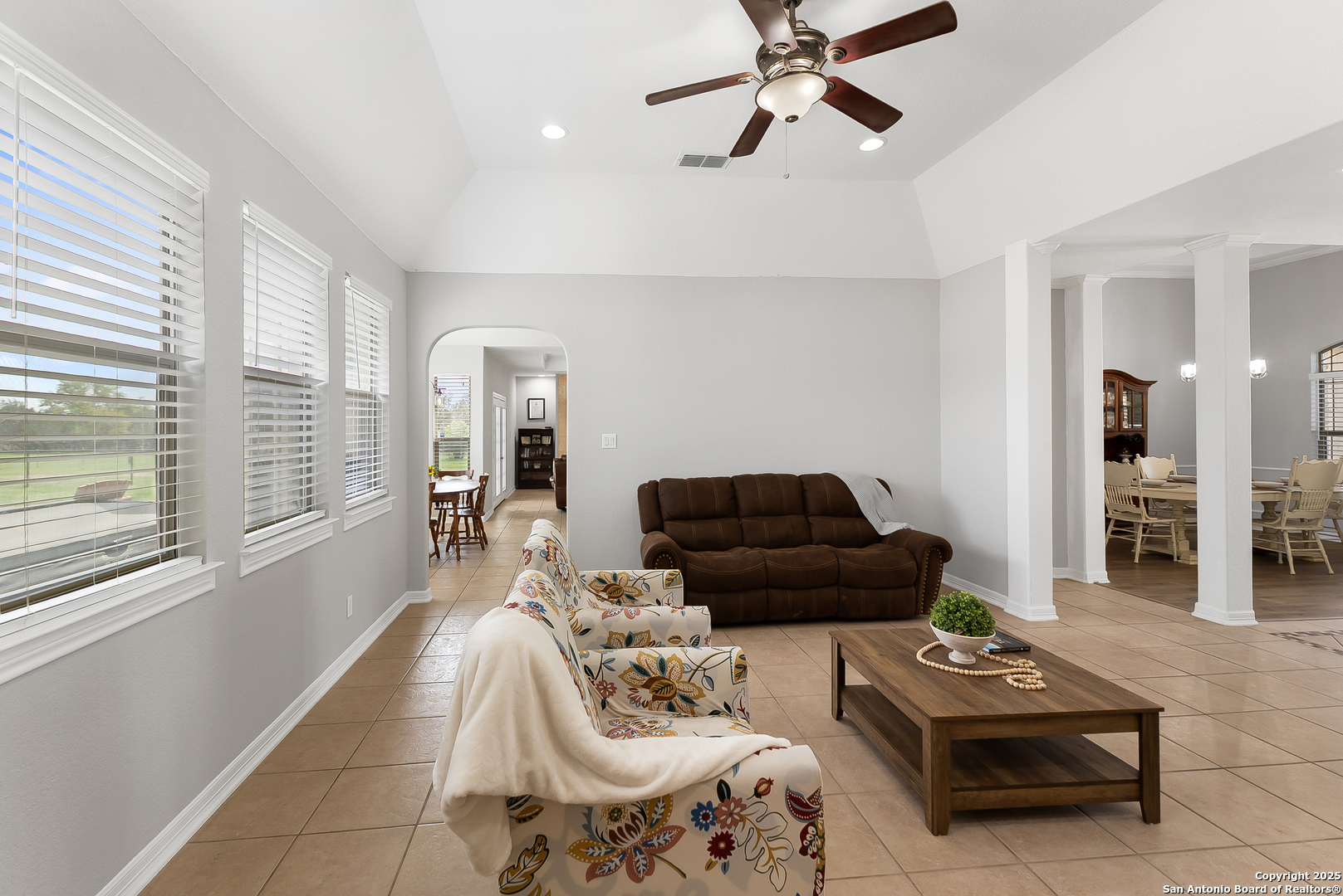 701 Kreutzberg Road Boerne, TX 78006 - Photo 17 of 43 a living room with furniture and a large window
