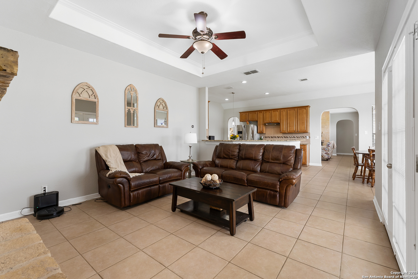 701 Kreutzberg Road Boerne, TX 78006 - Photo 18 of 43 a living room with furniture and a ceiling fan