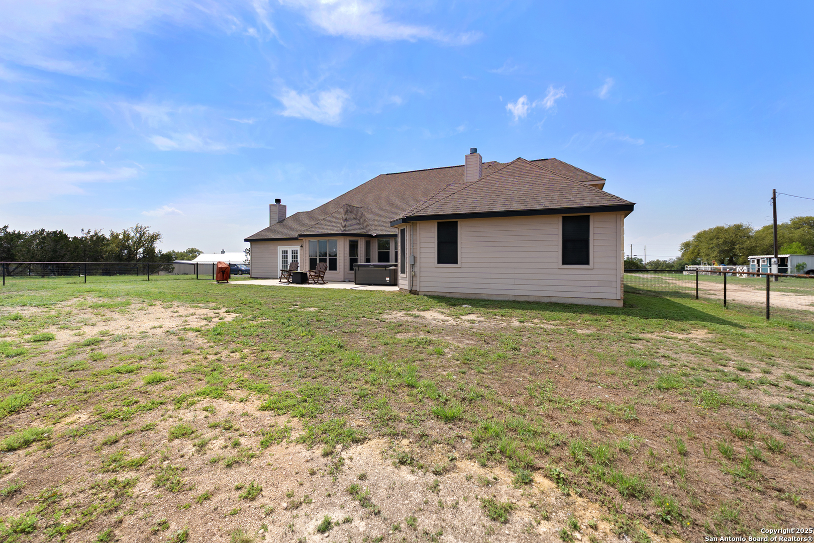 701 Kreutzberg Road Boerne, TX 78006 - Photo 40 of 43 a view of a house with a yard