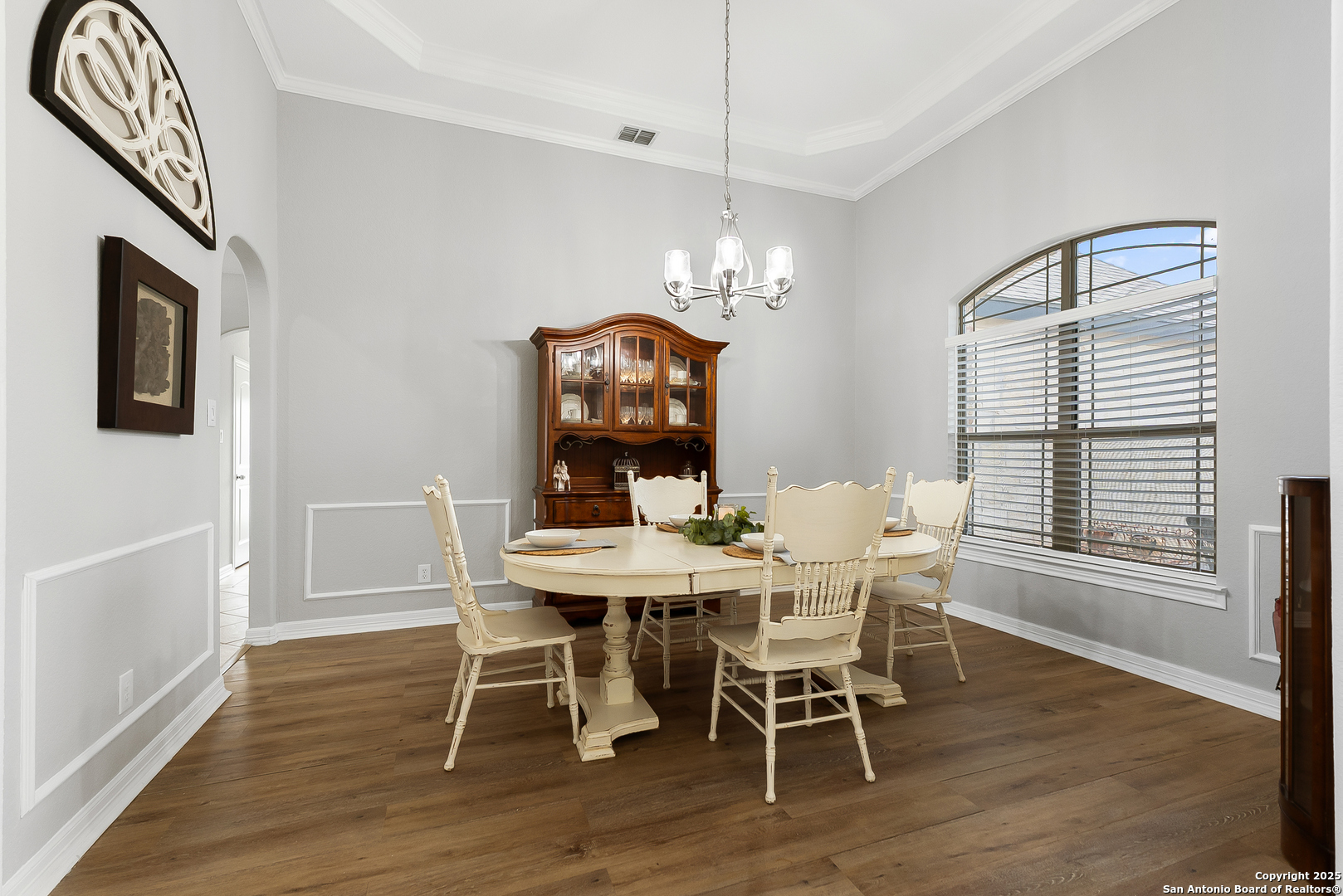 701 Kreutzberg Road Boerne, TX 78006 - Photo 7 of 43 a view of a dining room with furniture window and wooden floor