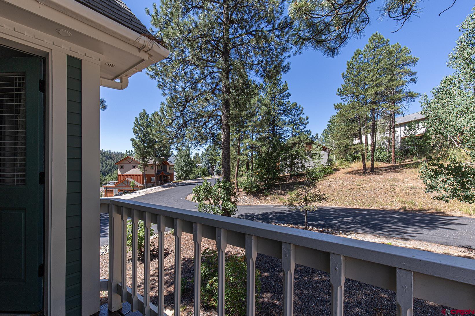 130 Hidden Treasure, Unit 1 Durango, CO 81301 - Photo 24 of 32 a view of a porch with a yard