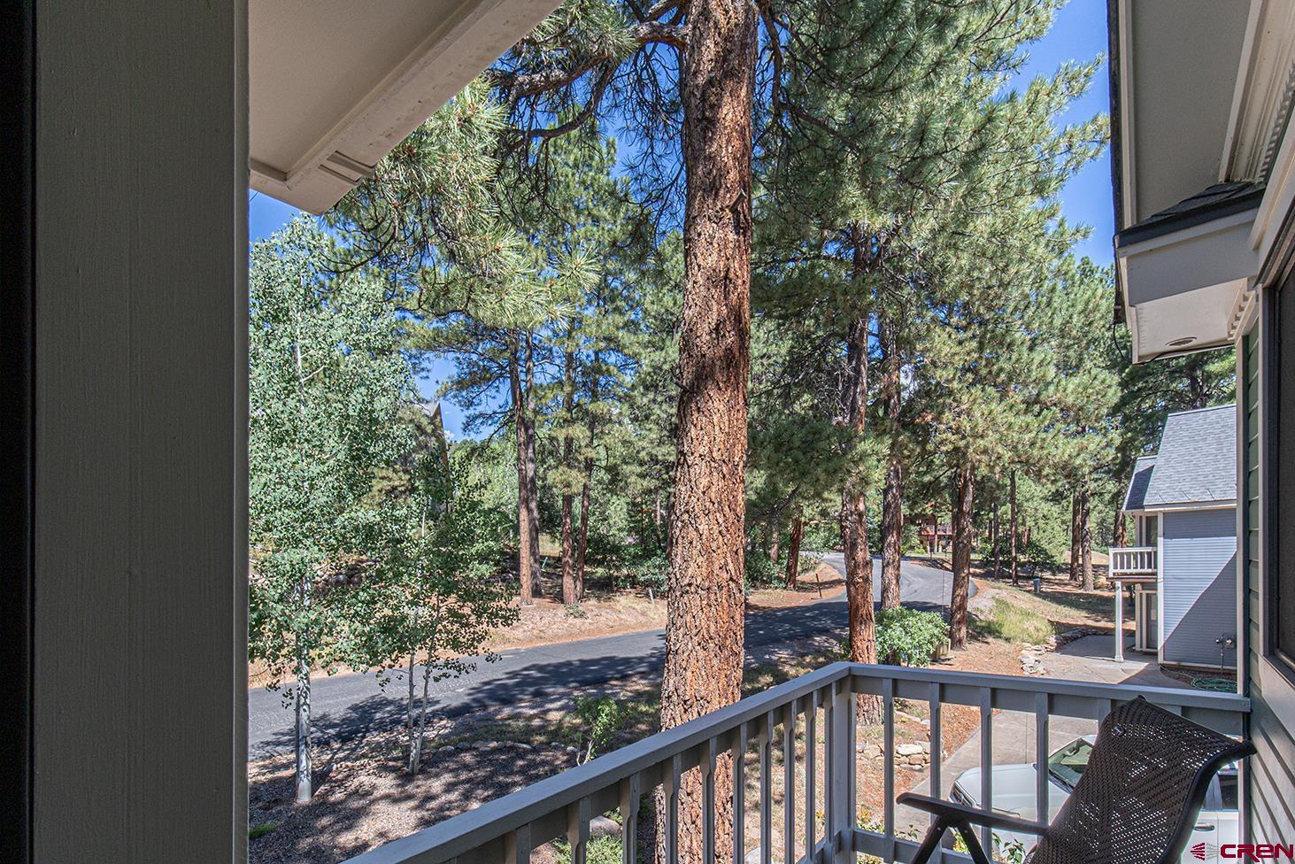 130 Hidden Treasure, Unit 1 Durango, CO 81301 - Photo 25 of 32 a view of a garden from a balcony