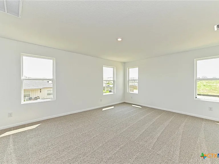 157 Seattle Slew Drive Jarrell, TX 76537 - Photo 19 of 37 Primary Bedroom