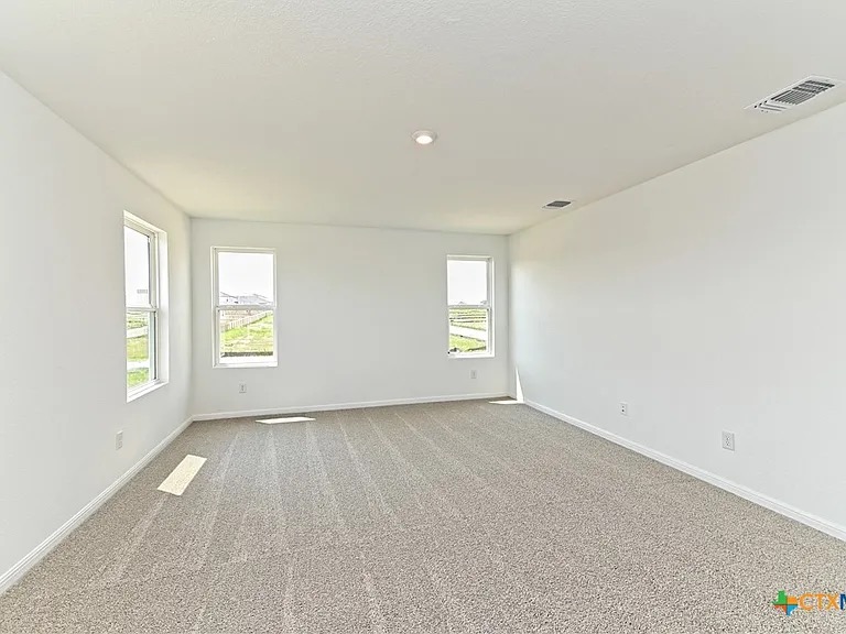 157 Seattle Slew Drive Jarrell, TX 76537 - Photo 20 of 37 Primary Bedroom