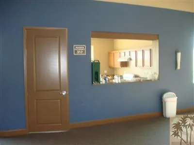 a view of a living room with furniture