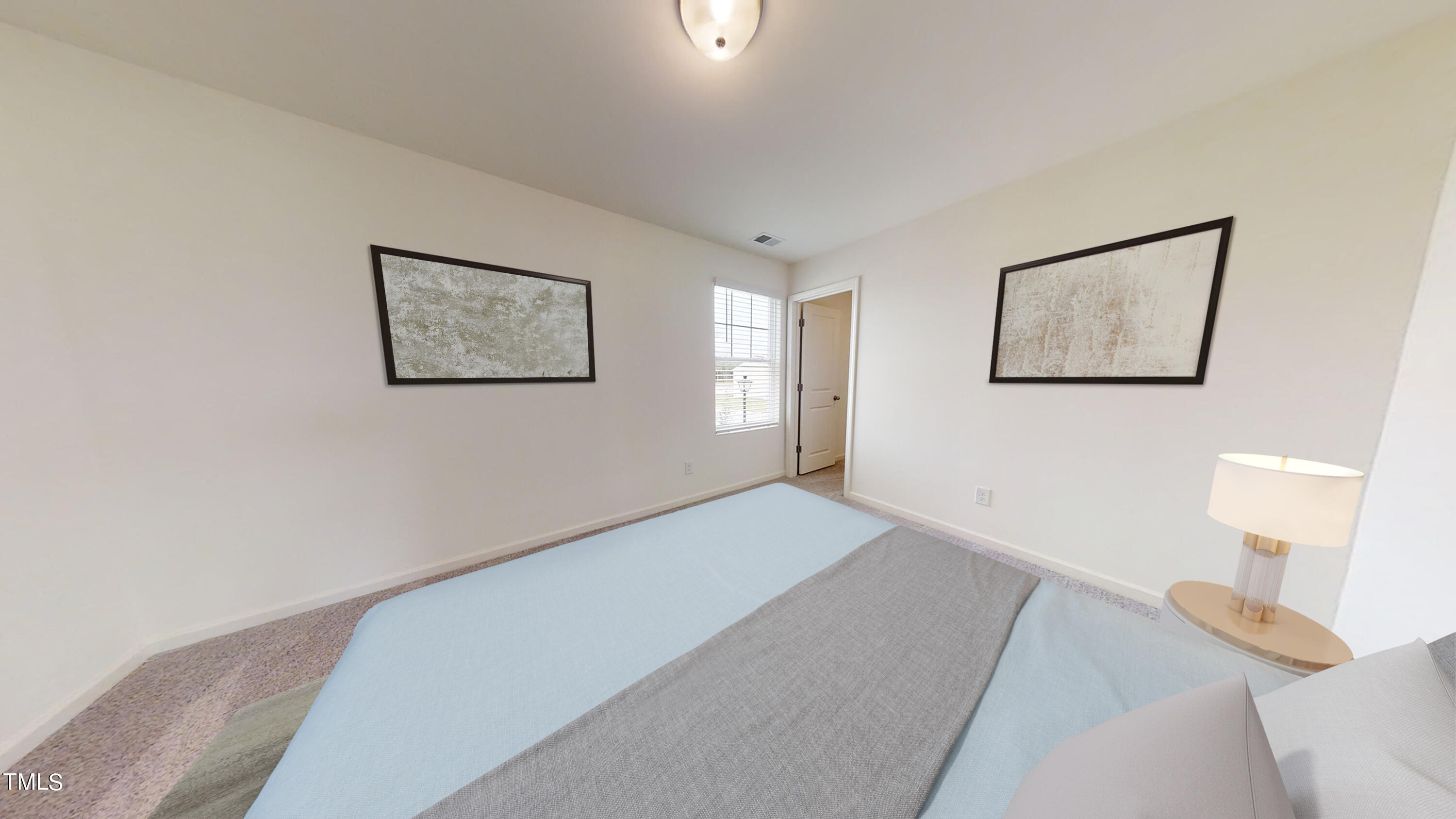 7374 Pilatus Avenue Spring Hope, NC 27882 - Photo 4 of 8 a bedroom with a bed and a window