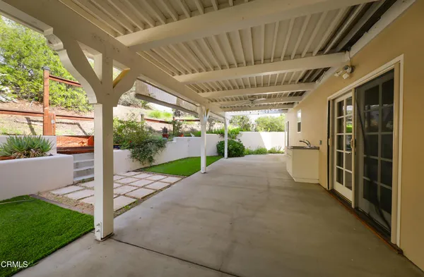 a view of a porch with backyard