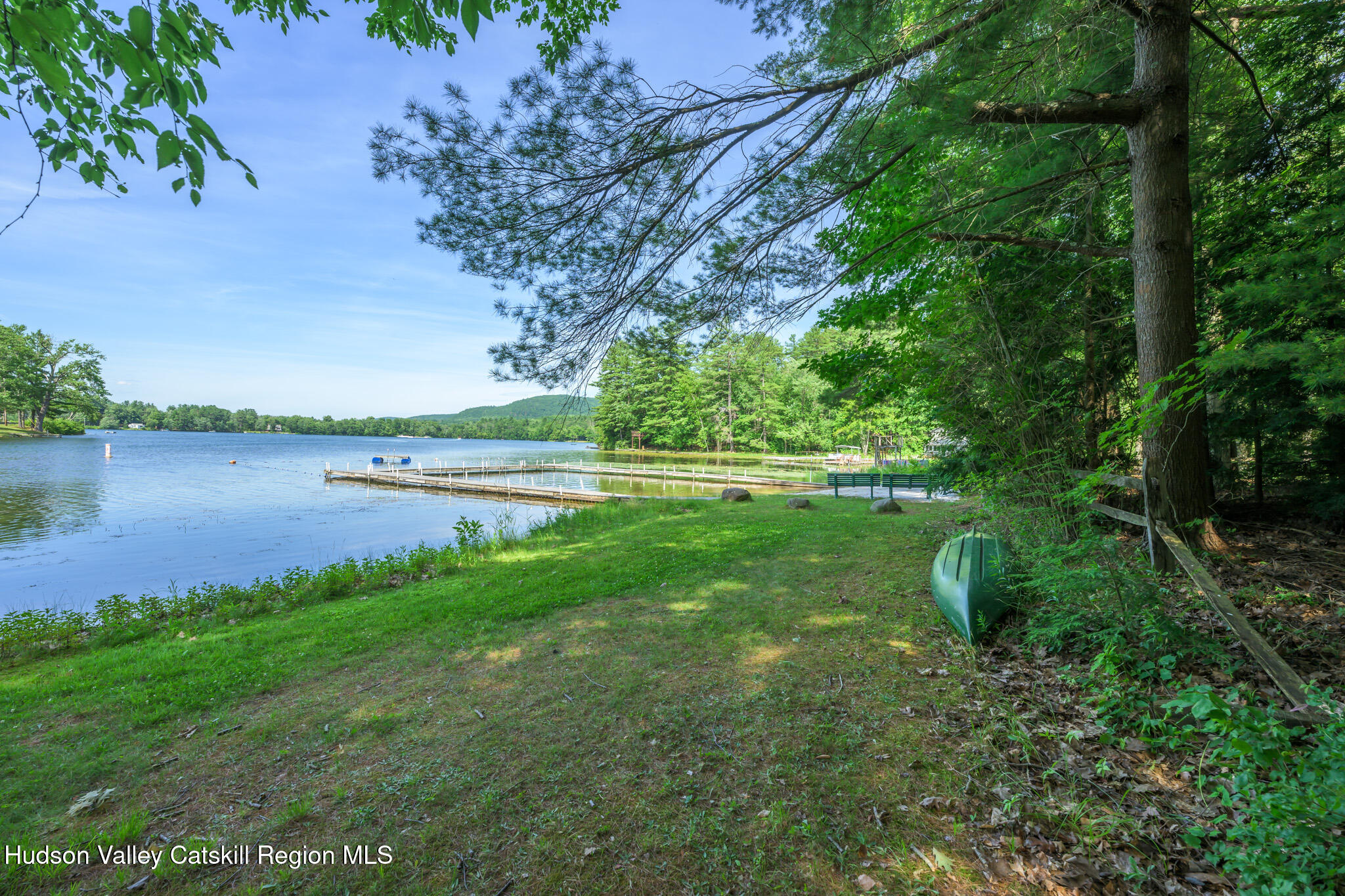 34 Queechy Shore Beach Road Canaan, NY 12029 - Photo 26 of 31 a view of a lake with houses in the back