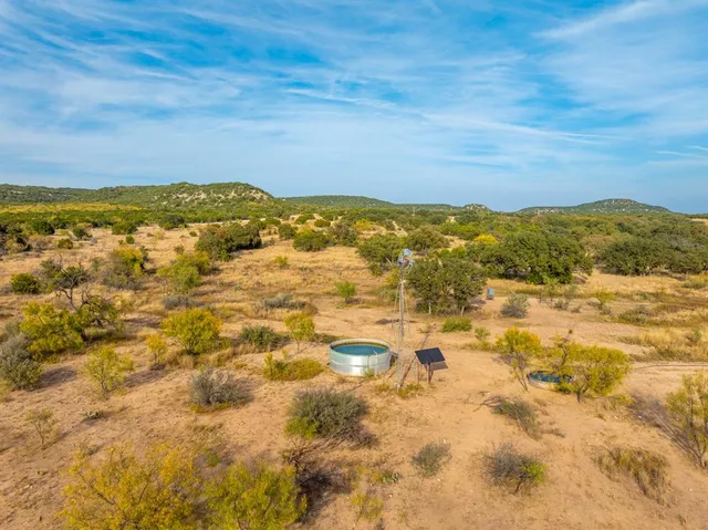 a view of a yard with an outdoor space