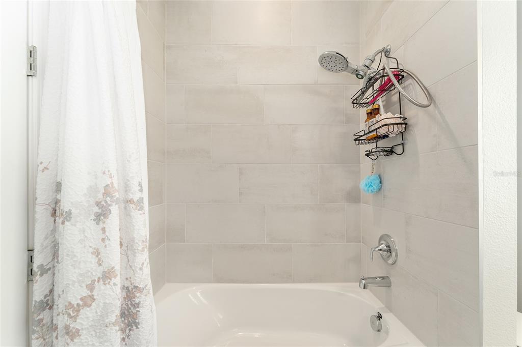 1244 Southeast 42nd Road Ocala, FL 34480 - Photo 50 of 56 a bathroom with a shower