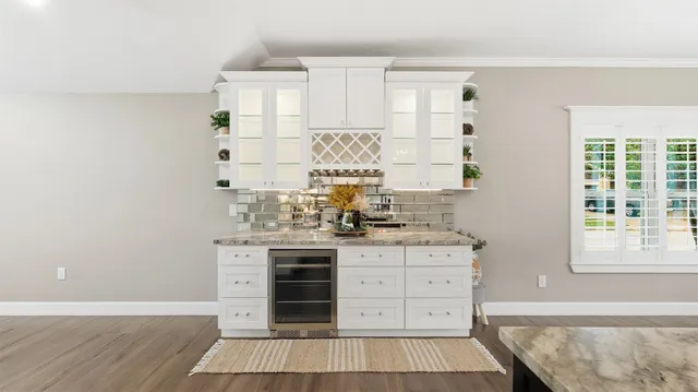 a view of a hallway to a bedroom
