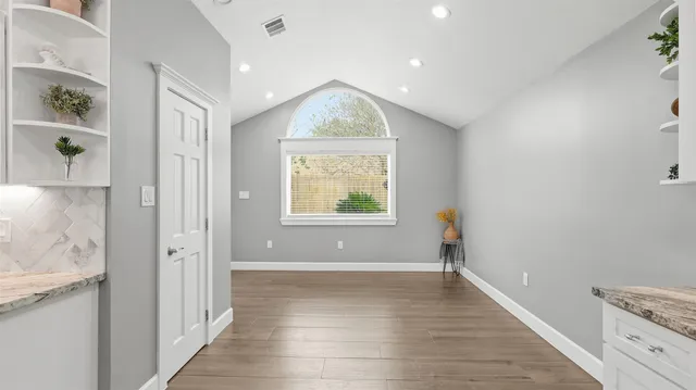 a bathroom with a sink and a shower