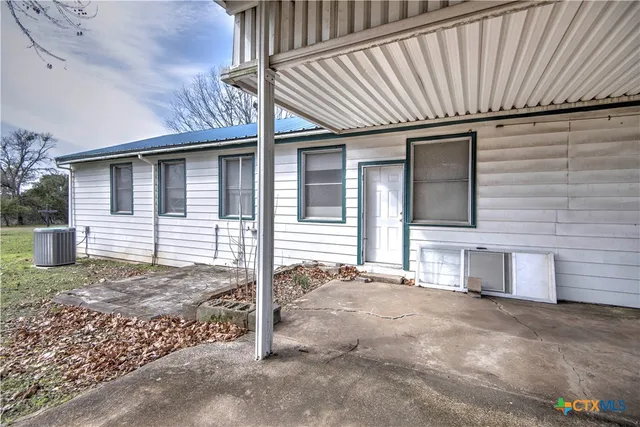 a front view of a house with garage