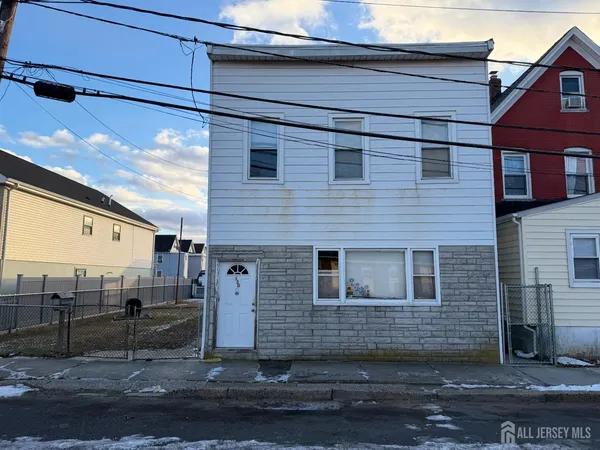 a view of a house with a street