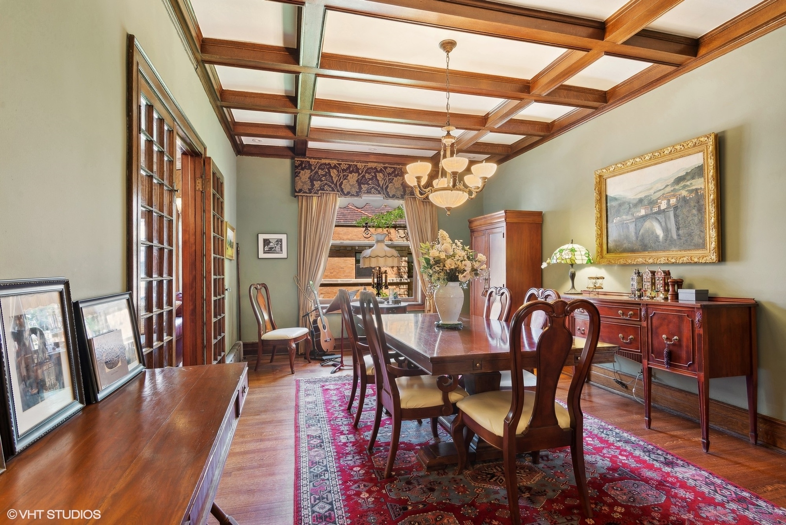 662 West Irving Park Road, Unit J4 Chicago, IL 60613 - Photo 11 of 31 a view of a dining room with furniture window and wooden floor