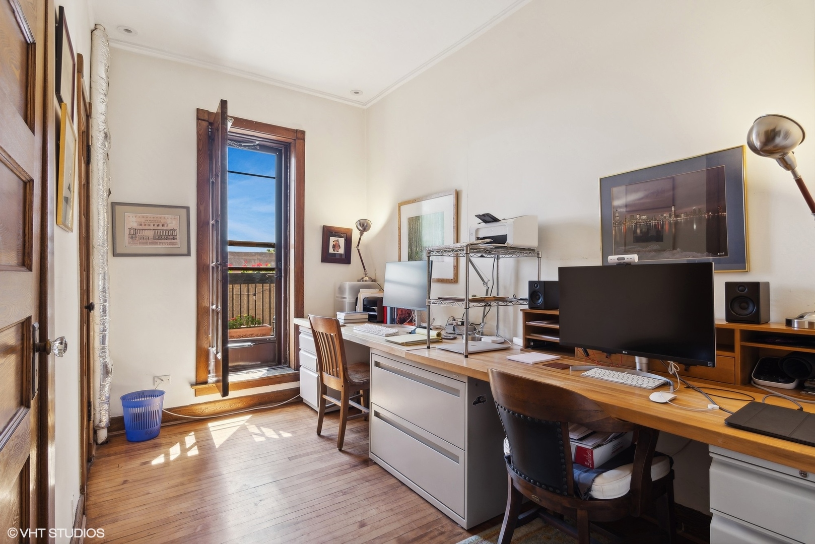662 West Irving Park Road, Unit J4 Chicago, IL 60613 - Photo 24 of 31 a view of a workspace with furniture and a window