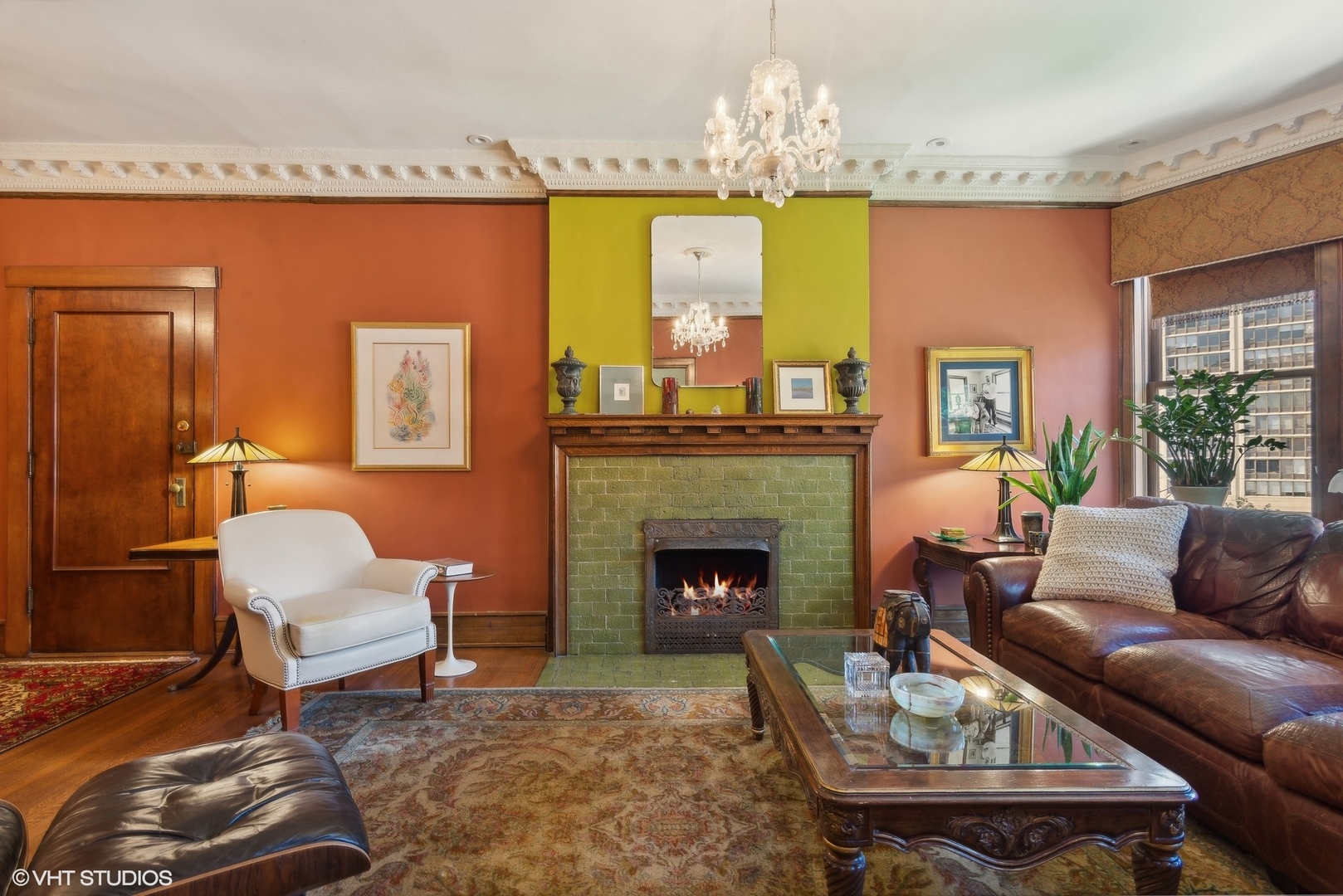 662 West Irving Park Road, Unit J4 Chicago, IL 60613 - Photo 6 of 31 a living room with furniture and a fireplace