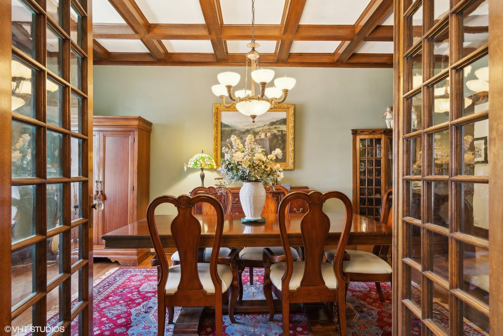 662 West Irving Park Road, Unit J4 Chicago, IL 60613 - Photo 10 of 31 a view of a dining room with furniture and chandelier